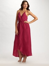A bare and beautiful interpretation of the classic wrap gown in fluid silk.Crossover bodice front and back X-back spaghetti straps Elasticized waist Front crossover tulip skirt About 41 from natural waist Silk; dry clean Imported A bare and beautiful interpretation of the classic wrap gown in fluid silk.Crossover bodice front and back X-back spaghetti straps Elasticized waist Front crossover tulip skirt About 41 from natural waist Silk; dry clean Imported