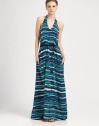 Bare your shoulders in this floor-sweeping silhouette of vibrant printed silk.Halter necklineFlat frontContrast sashSlash pocketsSide zipperAbout 41 from natural waistSilkDry cleanImportedModel shown is 5'10 (177cm) wearing US size Small.