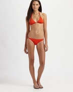 A unique take on the string bikini top. Halter strap ties at neckBack tie closureFully lined80% polyamide/20% elastaneHand washImported of Italian fabricPlease note: Bikini bottom sold separately. 