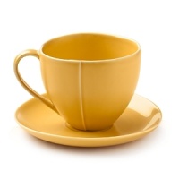 Borrowing from nature, these porcelain cups and saucers have a highly glossed surface and unusual contours, creating an interesting silhouette - a DVF signature - on the table. Borrowing from nature, these porcelain cups and saucers have a highly glossed surface and unusual contours, creating an interesting silhouette - a DVF signature - on the table.