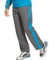 Set a steady pace of style and comfort with these Dri-Fit track pants from Nike.