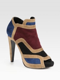 Sophisticated suede ankle boot in a colorblocked silhouette with a towering heel and peep toe. Self-covered heel, 5 (125mm)Partially covered platform, 1 (25mm)Compares to a 4 heel (100mm)Suede upperSide zipperPeep toeLeather lining and solePadded insoleMade in ItalyOUR FIT MODEL RECOMMENDS ordering one size up as this style runs small. Sophisticated suede ankle boot in a colorblocked silhouette with a towering heel and peep toe. Self-covered heel, 5 (125mm)Partially covered platform, 1 (25mm)Compares to a 4 heel (100mm)Suede upperSide zipperPeep toeLeather lining and solePadded insoleMade in ItalyOUR FIT MODEL RECOMMENDS ordering one size up as this style runs small.