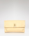 Balance fall's lush mood with understated accents like Marc Jacobs' fold over clutch. The compact piece is perfect for party season, but don't shy from showcasing this stunner in the daylight.