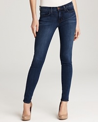 Subtle fading lends a love-worn feel to these J Brand jeans, tailored in a sleek, skinny silhouette. Subtle fading lends a love-worn feel to these J Brand jeans, tailored in a sleek, skinny silhouette.