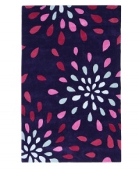 April showers. Colorful raindrops splash across the deep purple ground of this fresh and vibrant St. Croix area rug. Hand-tufted in India by skilled artisans, this rug is crafted from sumptuously soft wool with a thick pile that feels heavenly underfoot. April showers. Colorful raindrops splash across the deep purple ground of this fresh and vibrant St. Croix area rug. Hand-tufted in India by skilled artisans, this rug is crafted from sumptuously soft wool with a thick pile that feels heavenly underfoot.