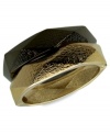 Slip on trendy texture with this stylish bangle bracelet set from GUESS. The pair features geometric designs in alluring tones. Crafted in hematite and gold tone mixed metal. Approximate diameter: 2 inches.