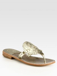 Perforated leather thong with detailed stitching and goldtone studs. Leather upperLeather lining and solePadded insoleImported Perforated leather thong with detailed stitching and goldtone studs. Leather upperLeather lining and solePadded insoleImported