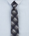 A classic check defines this wardrobe staple of rich Italian silk. SilkDry cleanMade in Italy