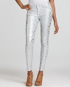 A metallic floral print shimmers on these 7 For All Mankind skinny jeans.