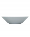 With a minimalist design and unparalleled durability, the Teema pasta bowl makes preparing and serving meals a cinch. Featuring a sleek, angled edge in glossy gray porcelain by Kaj Franck for Iittala.