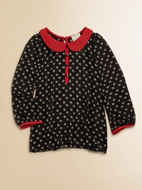 A little birdie told her about this adorable, lightweight, owl-printed blouse with contrasting trim and Peter Pan collar.Peter Pan collarLong sleeves with contrasting cuffsButton-front and backPolyesterDry cleanMade in the USA of imported fabric