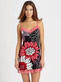 Bold, dramatic floral print jersey, softened by beautiful cross-dyed lace at neckline and hemSweetheart necklineBack-adjustable strapsAbout 33 longRayon/spandexMachine washImported Bold, dramatic floral print jersey, softened by beautiful cross-dyed lace at neckline and hemSweetheart necklineBack-adjustable strapsAbout 33 longRayon/spandexMachine washImported