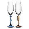 The Two Of Us champagne glasses are a tribute to everlasting love and the joy of finding that person who will always stand by you. Designed by Kjell Engman for Kosta Boda.