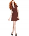 In a wool-blend tweed fabric, this Kensie sheath dress features faux-leather trim for a truly fashion-forward fall look!