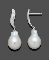 Beauty at its finest. Belle de Mer's Baroque-style drop earrings highlight a cultured freshwater pearl (11-12 mm) and a swirling post setting dusted with diamond accents. Crafted in 14k white gold. Approximate drop: 1-1/4 inches. Beauty at its finest. Belle de Mer's Baroque-style drop earrings highlight a cultured freshwater pearl (11-12 mm) and a swirling post setting dusted with diamond accents. Crafted in 14k white gold. Approximate drop: 1-1/4 inches.