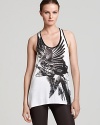 Your personal style is flying high and it's clear when you work this Helmut Lang bird-print tank. Boasting a sporty racerback and high/low hem, it's cool solo or layered under a sheer cardi.