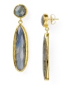 Coralia Leets has refined daytime jewelry by blending natural stones with elegantly simple construction. Here the designer combines labradorite and 22-karat gold to create a pair of delicate drop earrings.