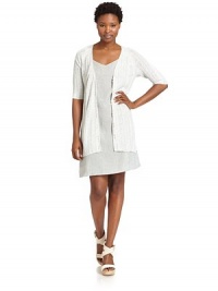 THE LOOKOpen weave ribbed designFront button closureThree-quarter length sleevesTHE FITAbout 32 from shoulder to hemTHE MATERIAL45% linen/33% viscose/22% nylonCARE & ORIGINHand washImportedModel shown is 5'9½ (176cm) wearing US size Small. THE LOOKOpen weave ribbed designFront button closureThree-quarter length sleevesTHE FITAbout 32 from shoulder to hemTHE MATERIAL45% linen/33% viscose/22% nylonCARE & ORIGINHand washImportedModel shown is 5'9½ (176cm) wearing US size Small.