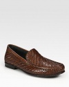 Hand burnished and hand-woven Italian leather offers this slip on loafer unparalleled style.Leather upperLeather liningPadded insoleLeather soleMade in Italy