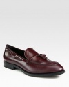 Front tassels and kiltie trim add moccasin inspiration to these glossy, Italian leather loafers. Leather upperLeather liningPadded insoleRubber soleMade in Italy