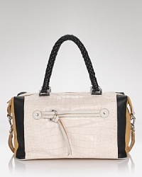 Ladylike style gets a hit of cool with this color blocked leather satchel from Elie Tahari. On-trend and textured, this shapely bag instantly updates wardrobe favorites. Ladylike style gets a hit of cool with this color blocked leather satchel from Elie Tahari. On-trend and textured, this shapely bag instantly updates wardrobe favorites.