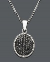 Complete your whole look with bold black black sparkle and versatile design. Oval-shaped pendant features round-cut black diamonds (1/4 ct. t.w.) trimmed with white diamond edges. Crafted in sterling silver. Approximate length: 18 inches. Approximate drop: 7/8 inch.