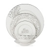 The couture designer Monique Lhuillier celebrates her first creative collaboration with Waterford Crystal with the Sunday Rose Collection. Inspired by her iconic Sunday Rose wedding gown, this formal 5-piece place setting is a sophisticated symphony of fine bone china and precious platinum details.