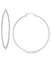 Round and resplendent. These hoop earrings are crafted from 14k white gold with diamond accents providing a lustrous touch. Approximate diameter: 1-3/4 inches.
