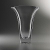 Bring sophistication and elegance to your foyer or dinner table with Karim Rashid's Planar Vase. Reminiscent of his ever popular Planar Bowl, this full-lead crystal vase has a beautifully wide opening to allow your flowers to fall softly against the edges.