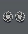 Stunning in stark contrast, these flower studs glimmer with black diamonds (1/3 ct. t.w.) and white round-cut diamonds (1/8 ct. t.w.). Earrings crafted in sterling silver. Approximate diameter: 1/4 inch.
