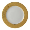 Featuring a spectacular patterned band that recalls the golden majesty of sunlight, this superior plate from Bernardaud lends dramatic sophistication to your elegant table setting.