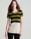 A cozy cotton knit takes on summer style--this striped and crocheted Burberry Brit sweater blends sporty style with casual elegance.