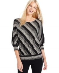 Studio M's top is easy style with a relaxed fit and a diagonal stripe print. Studio M's top is easy style with a relaxed fit and a diagonal stripe print.