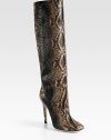 Cowboy grit meets cocktail glitz in this ultra-luxe python boot. Self-covered heel, 4¾ (120mm)Shaft, 15Leg circumference, 13¼Python upperPull-on styleLeather lining and solePadded insoleMade in Italy