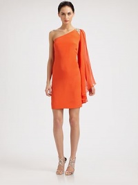 Supple silk crepe, tailored in a sleek, body-conscious silhouette and adorned with a chiffon sleeve and jeweled details.Asymmetrical necklineJeweled shoulder detailSingle long, sheer bell sleeveConcealed side zipFully linedAbout 20 from natural waistSilkDry cleanImportedModel shown is 5'11 (180cm) wearing US size 4. Supple silk crepe, tailored in a sleek, body-conscious silhouette and adorned with a chiffon sleeve and jeweled details.Asymmetrical necklineJeweled shoulder detailSingle long, sheer bell sleeveConcealed side zipFully linedAbout 20 from natural waistSilkDry cleanImportedModel shown is 5'11 (180cm) wearing US size 4.