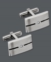 Stylish sophistication. This chic pair of cuff links is the perfect accent for the modern man. Crafted in stainless steel, cuff links feature a black enamel stripe with a sparkling diamond accent. Cuff links have swivel backs for ease of use. Approximate length: 3/4 inch. Approximate width: 1/2 inch.
