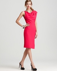 An asymmetrically cut bodice adds edge to this otherwise sophisticated Black Halo sheath. An asymmetrically cut bodice adds edge to this otherwise sophisticated Black Halo sheath.