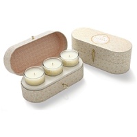 Packaged in an attractive oval box, this set of three fragrant votive candles makes a sweet, vanilla orange-scented gift.