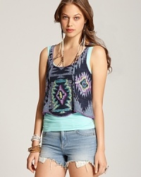 Rock the global trend in this Free People tribal print tank--lively with pops of pink and turquoise embroidery juxtaposed against earthy tones for the perfect summer look. Rock the global trend in this Free People tribal print tank--lively with pops of pink and turquoise embroidery juxtaposed against earthy tones for the perfect summer look.