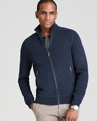 A handsome wear-anytime cardigan rendered in a fine blend of wool and cashmere with a bit of stretch, utterly versatile and always soft. A handsome wear-anytime cardigan rendered in a fine blend of wool and cashmere with a bit of stretch, utterly versatile and always soft.