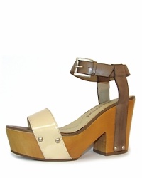 A modern clog from Luxury Rebel--the Fern boasts patent accents on a minimalist silhouette. A modern clog from Luxury Rebel--the Fern boasts patent accents on a minimalist silhouette.