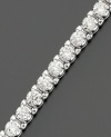 Round-cut diamonds (3 ct. t.w.) set in 14k white gold radiate chic glamour on this extraordinarily beautiful diamond bracelet.
