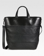 Iconic woven leather tote with adjustable shoulder strap for comfortable cross-body wear.Magnetic snap button closureTop handleAdjustable shoulder strapFully lined12¾W x 14½H x 6½DMade in Italy