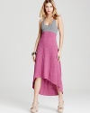 This ALTERNATIVE maxi dress boasts a high/low hem and two-tone color scheme for striking interest.