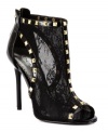 Sexy prints are front and center. Bebe's Lexington booties feature cutouts on the sides and a studded detail along the edges.