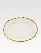 An elegant, sculptural and incredibly versatile platter is crafted in ceramic stoneware and finished with handpainted detail. From the Classic Bamboo Collection 13½ X 20 Dishwasher safe Imported 