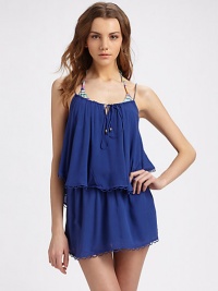 Delicate scalloped trim details the playful tiers of this flowy design, complete with a drawstring neckline.Spaghetti straps Drawstring neckline with metal tie pulls Tiered ruffle hem Scalloped trim Logo charm on back About 30 from shoulder to hem Rayon Hand wash Imported Additional Information Women's Premier Designer & Contemporary Size Guide Delicate scalloped trim details the playful tiers of this flowy design, complete with a drawstring neckline.Spaghetti straps Drawstring neckline with metal tie pulls Tiered ruffle hem Scalloped trim Logo charm on back About 30 from shoulder to hem Rayon Hand wash Imported Additional Information Women's Premier Designer & Contemporary Size Guide