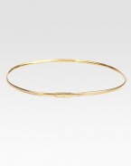 A narrow style in rose goldtone brass with an interlocking push clasp closure. Width, about ¼Made in Italy