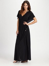 Seamlessly designed with laser-cut edges and a deep v-neck and plunge back for a seductive-yet-relaxed fit. And thanks to its new jersey fabrication, it's super soft as well.V-neckDolman sleevesDrawstring Empire waistPull-on styleHigh side slitsAbout 39 from natural waist84% polyamide/16% elastaneHand washImported Seamlessly designed with laser-cut edges and a deep v-neck and plunge back for a seductive-yet-relaxed fit. And thanks to its new jersey fabrication, it's super soft as well.V-neckDolman sleevesDrawstring Empire waistPull-on styleHigh side slitsAbout 39 from natural waist84% polyamide/16% elastaneHand washImported