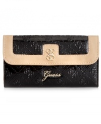 A pretty patent look that brings the shine. This slim clutch design from GUESS keeps your essentials organized in chic style. Ideal for the everyday. A pretty patent look that brings the shine. This slim clutch design from GUESS keeps your essentials organized in chic style. Ideal for the everyday.